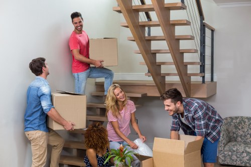 Man with van loading furniture for a Barnet home move