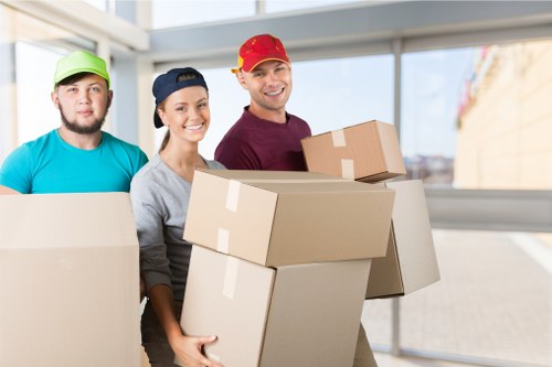 Removal team preparing a move with safety equipment and insured handling