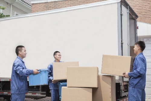 Furniture and boxes being loaded into a van for Barnet removal