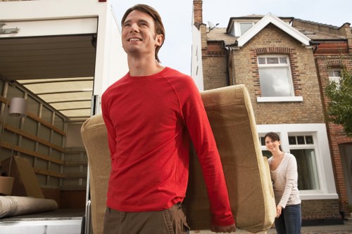 Staff member using PPE during a house removal job