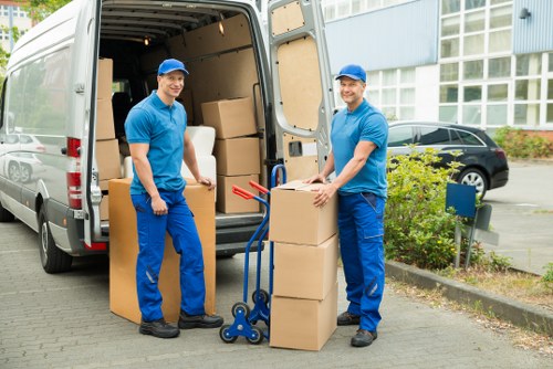 Packed office furniture and boxes ready for a business move