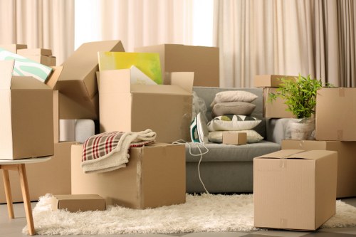 Packing and unpacking team working in a Barnet flat with careful room-by-room sorting