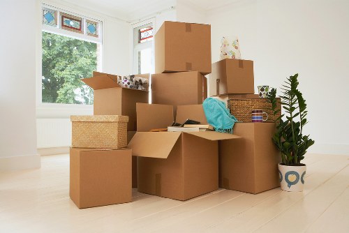 A well-organised Barnet moving day with protective wrapping and labelled boxes