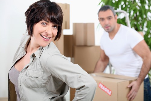 Professional movers handling a flat removal in Barnet with stairs access